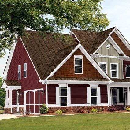 white house with burgundy metal roof|Guide to Metal Roof Styles: Colors, Paint, and Accents.